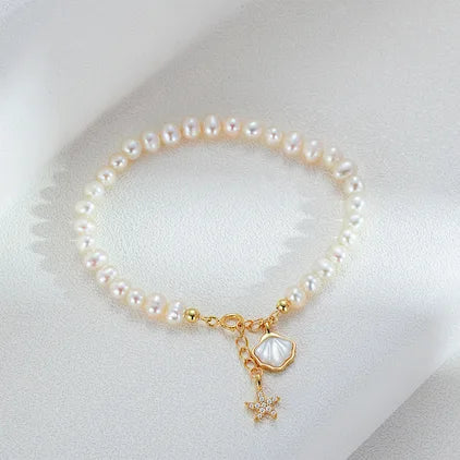 Gold Plated Pearl Bracelet with Coastal Charms