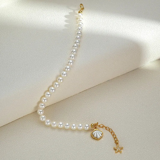 Gold Plated Pearl Bracelet with Coastal Charms