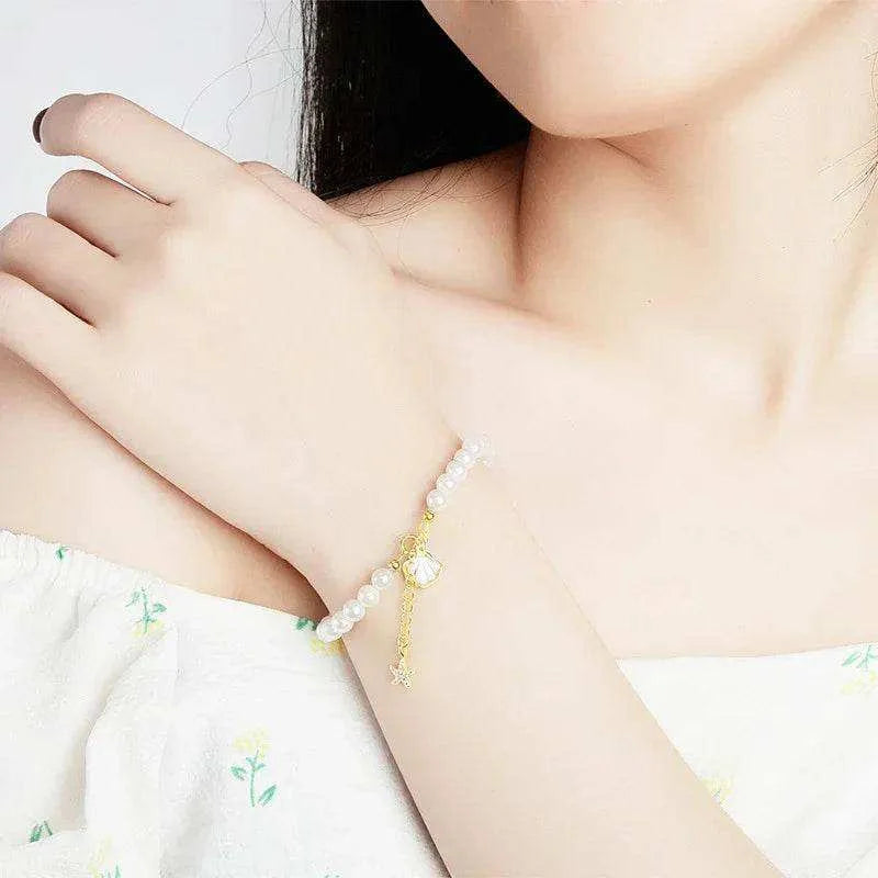 Gold Plated Pearl Bracelet with Coastal Charms