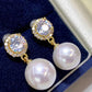 Pearl and crystal earrings in a jewelry box