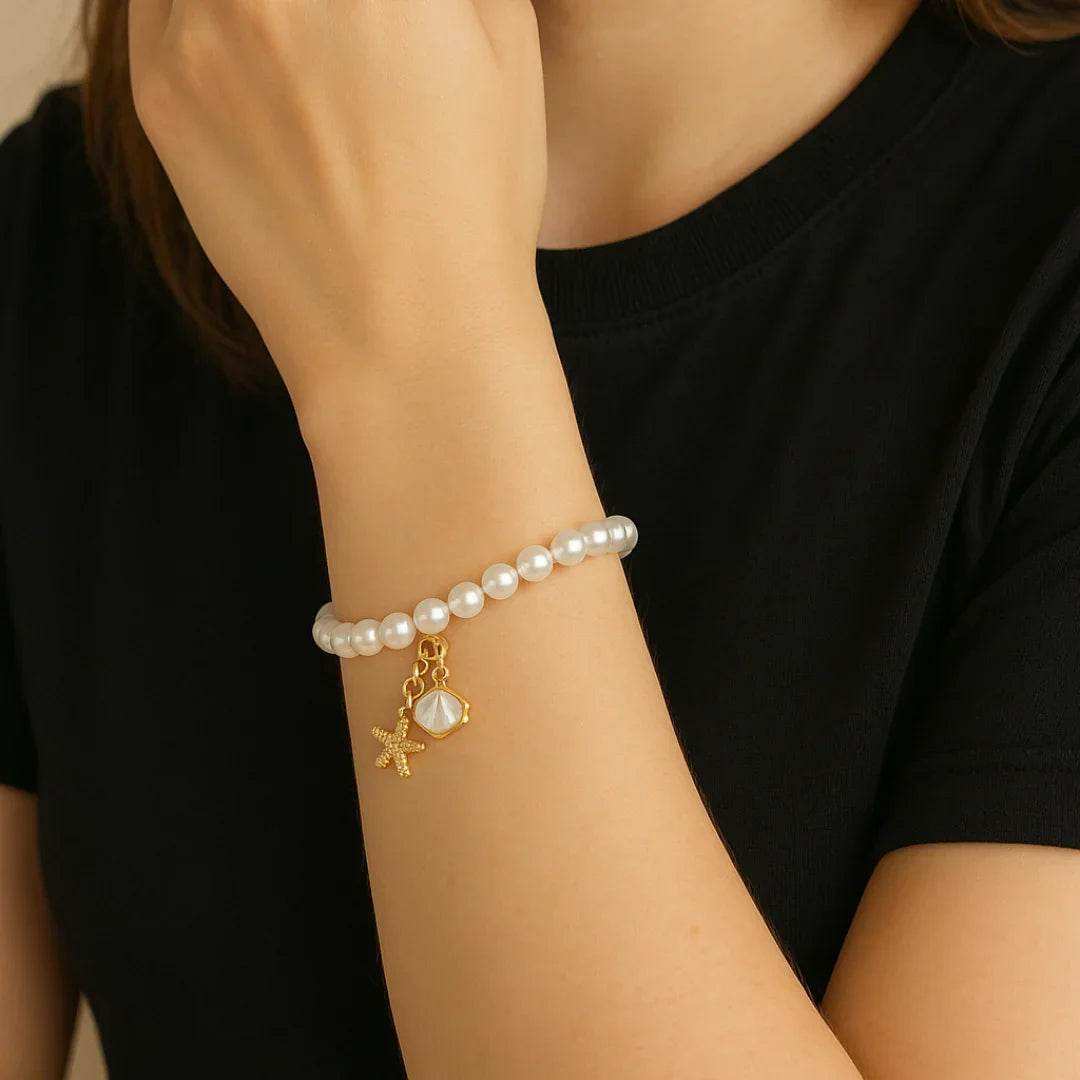 Gold Plated Pearl Bracelet with Coastal Charms - Eclat