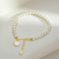Gold Plated Pearl Bracelet with Coastal Charms