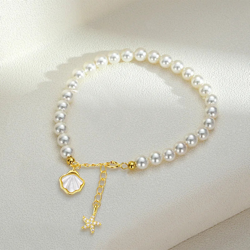 Gold Plated Pearl Bracelet with Coastal Charms